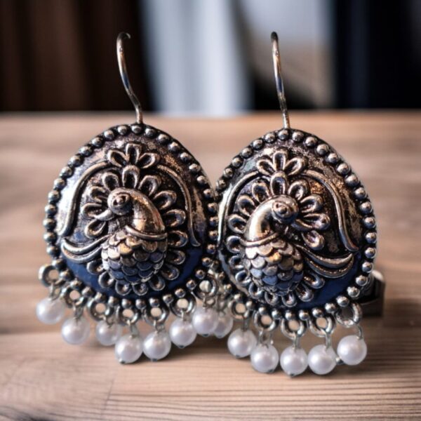 Silver fish-hook peacock earring - Image 2