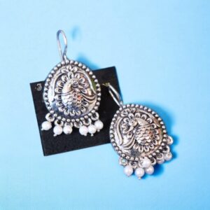 Silver fish-hook peacock earring