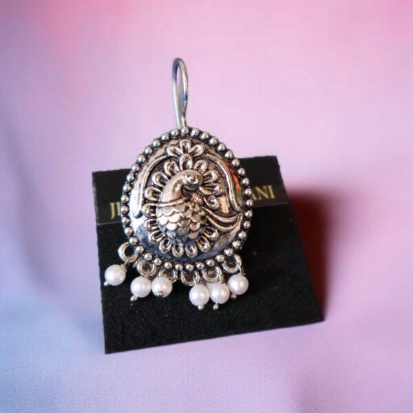 Silver fish-hook peacock earring - Image 3