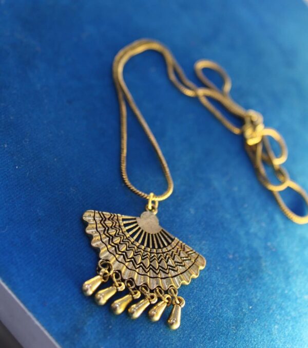 Golden long pendant