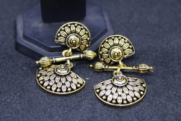 Golden contemporary drop earring
